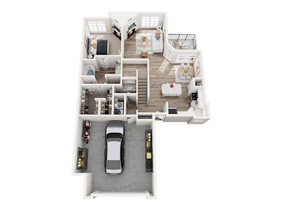 A car is parked in a garage attached to a house.
