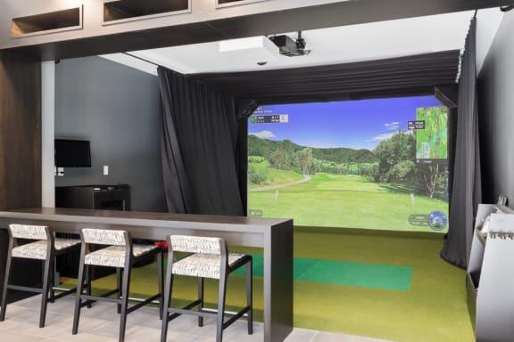 a bar in a room with a view of a golf course at Stonehill at West Orange, West Orange, 07052