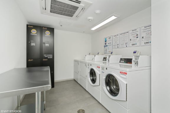 a washer and dryer room at Carver and Slowe Apartments, Washington, DC, 20001