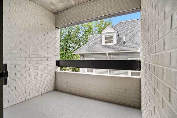 a view of a house from the inside of a garage door