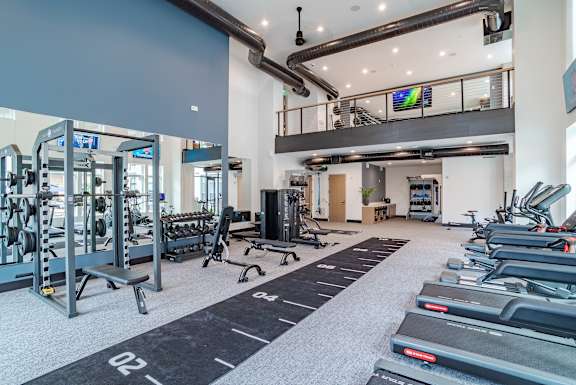 Two story fitness facility with mezzanine and training zone at The Yancey Apartments, North Carolina, 28217