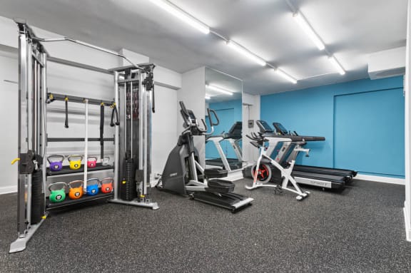 fitness center with free weights and cardio machines at Park Crescent, Washington, 20009