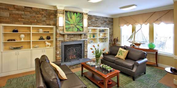 Living Room with a Fireplace at Hammarlee House Apartments, Glen Burnie