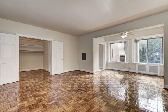 room with wood floors and white walls and doors at Park Crescent, Washington