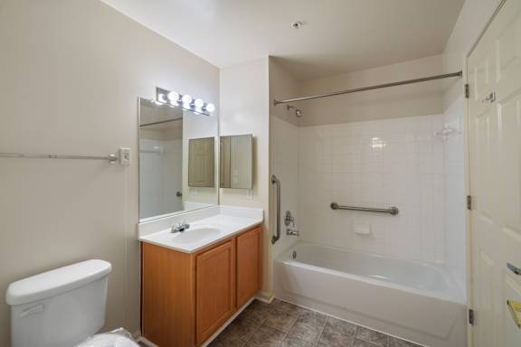 Bathroom with mirror at River Point Apartments, Essex, MD, 21221
