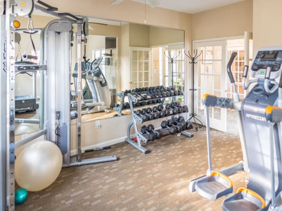 Versailles apartments in Towson, MD fitness center with various workout equipment