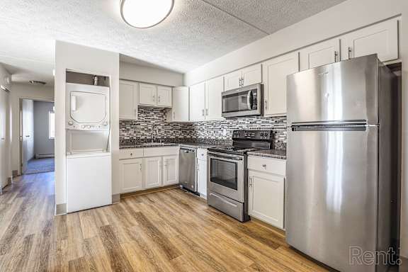 Kitchen with a refrigerator, oven, and microwave at Summit Terrace, Maine, 4106