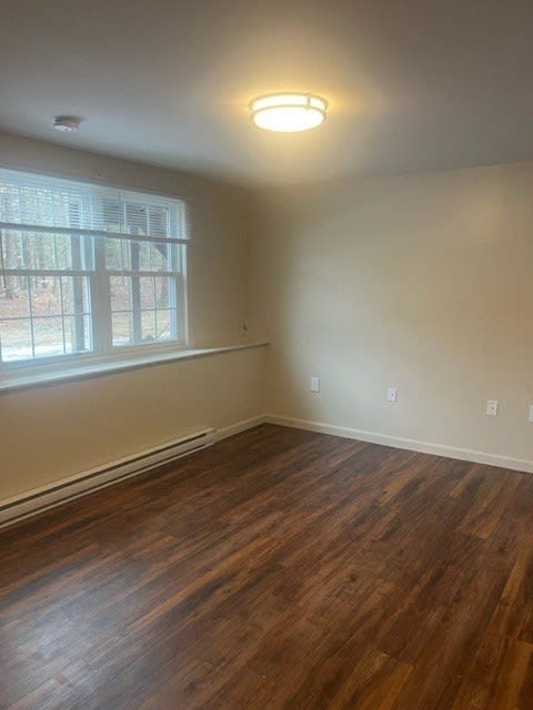 Unfurnished Living Room at Summit Terrace at Woodland, Cape Elizabeth, Maine