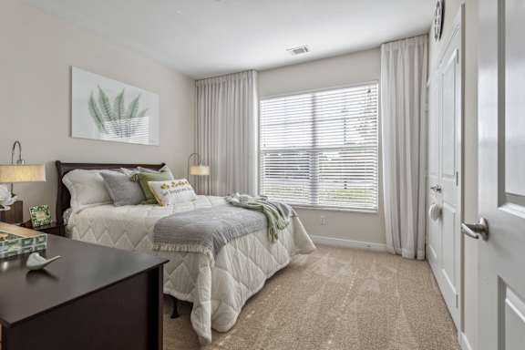 Bedroom With Expansive Windows at Century Hampton Roads, Suffolk, VA