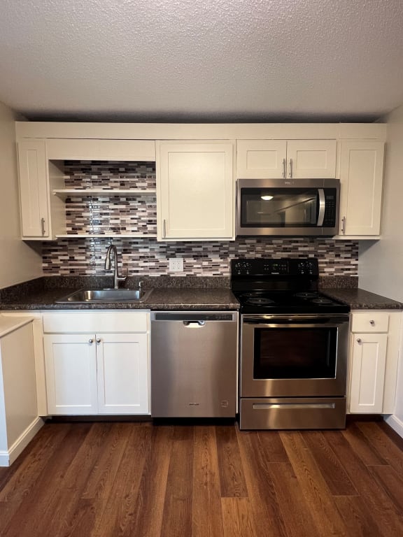 Kitchen decor with cabinets at Summit Terrace at Woodland, Cape Elizabeth, Maine