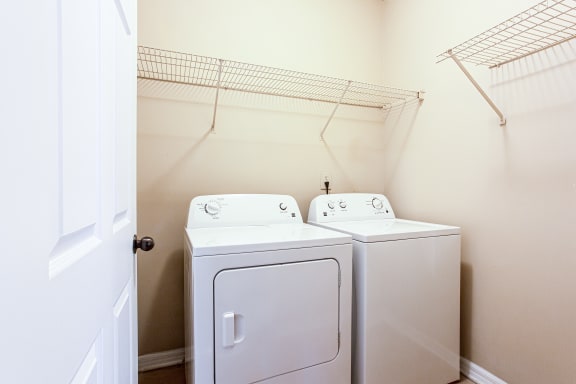 a washer and dryer in the laundry room  at Avenues of Kennesaw East &amp; West, Georgia, 30144