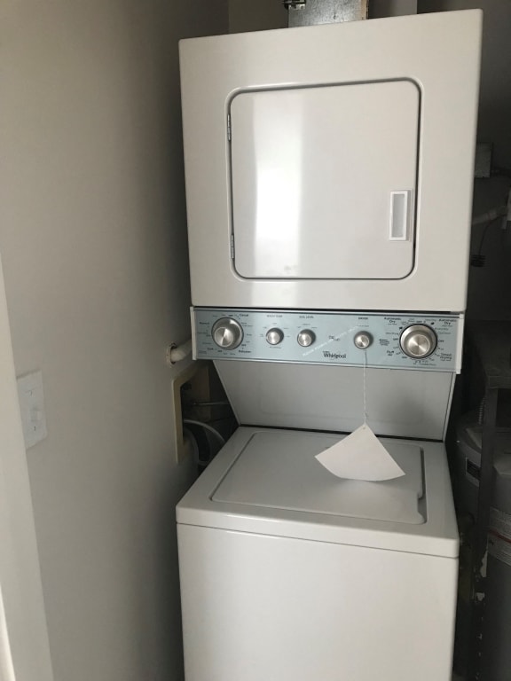 a washer and dryer in a room at Carisbrooke at Manchester Apartments, New Hampshire, 03102