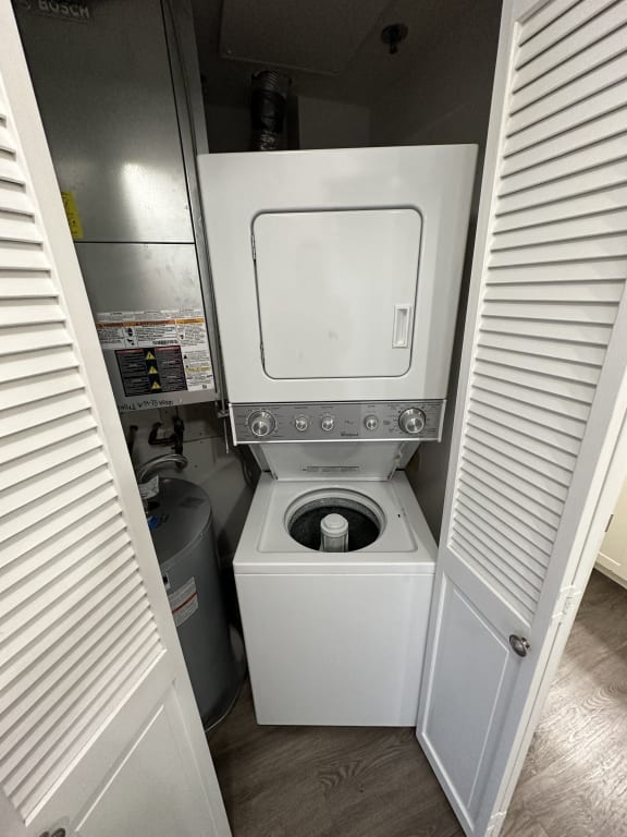 in unit washer and dryer in a closet at Carisbrooke at Manchester Apartments, Manchester