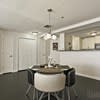 a dining room with a table and chairs at Carisbrooke at Manchester Apartments, Manchester, NH
