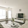 a living room with a couch and a television at Carisbrooke at Manchester Apartments, Manchester, 03102