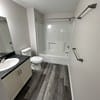a bathroom with a sink and a toilet at Carisbrooke at Manchester Apartments, Manchester, NH