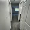 a blurry picture of a hallway in a house at Carisbrooke at Manchester Apartments, Manchester