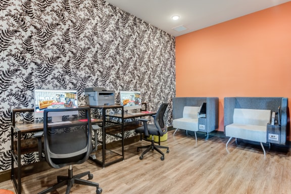 a workspace with two desks two chairs and a printer at Century Belmont Station, Louisville, KY, 40243