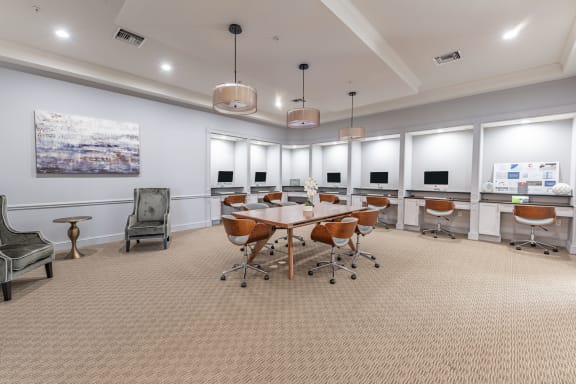 a large conference room with a large table and chairs