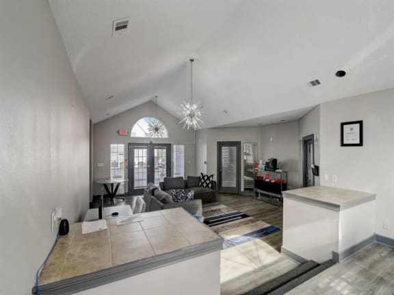 the living room and kitchen of a new home