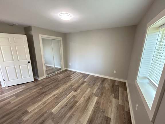 A room with wooden flooring and a white door at Briarcliff at Quechee, Quechee, VT, Vermont  , 5059