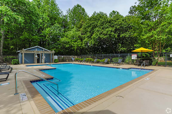 our apartments showcase a swimming pool at SoCO Apartments at Vinings, Georgia