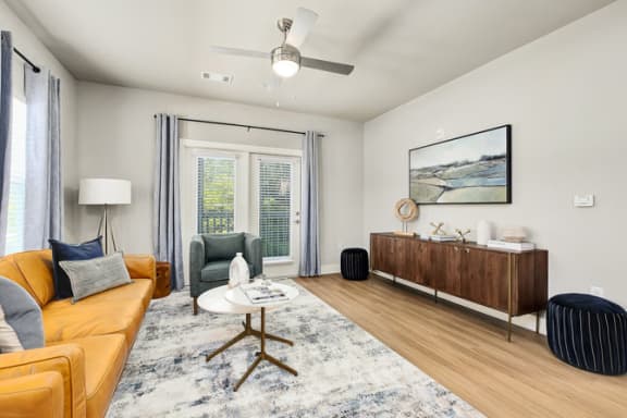 Spacious Living Room With Plank Flooring at Exchange at St Augustine, Florida