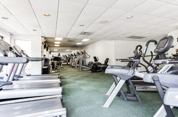 a fully equipped gym with treadmills and elliptical machines at Lory of Harbison, Columbia, 29212