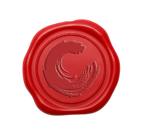 A red wax seal with a circular design in the center.