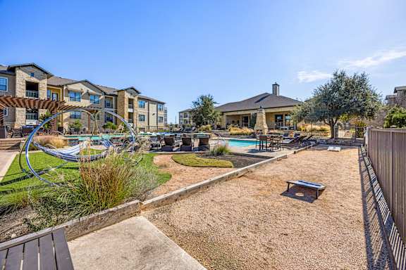 playground and a pool. at The Royce at 8100, Texas