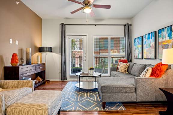 Living Room With Ceiling Fan at Bridge at Southpark Meadows, Austin, TX