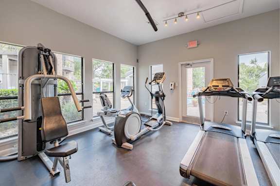 A gym with treadmills, exercise bikes, and other equipment. at Montecito, Austin, Texas