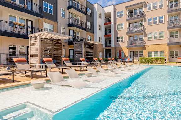 Poolside Lounge Chairs at Bridge at Henley, Austin
