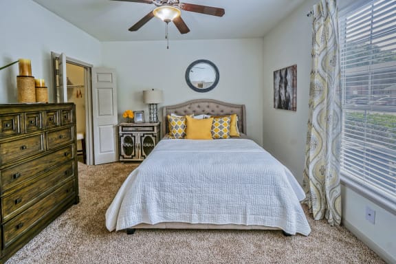 Bedroom With Ceiling Fanat The Aster Sugar Land Apartments, Sugar Land, Texas