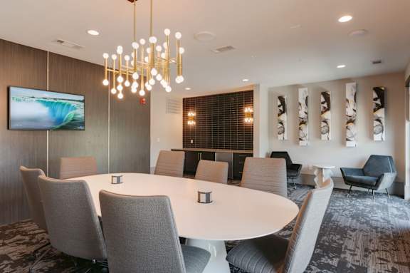Conference room with a large table and chairs at Caldwell, Texas