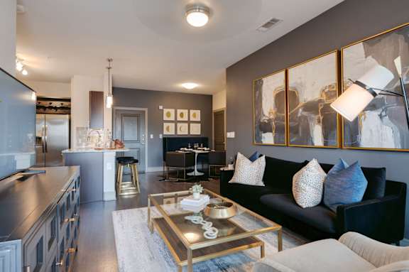 Living Area With Kitchen View at Caldwell, Texas