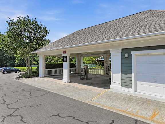 Covered parking area with ev charging stations at Alden Place at South Square Apartments, Durham, 27707