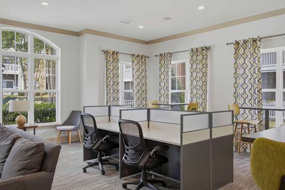 Coworking space with office cubicles and lounge seating at Alden Place at South Square Apartments, North Carolina, 27707
