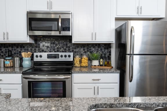 Close up photo of kitchen appliances and backsplash  at Ansley Town Center, Georgia, 30809
