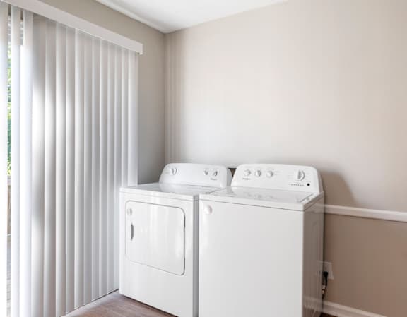 White Laundry Room Machines at Arbors at Smyrna, Smyrna