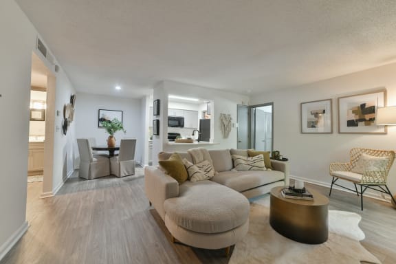 Living room with a couch and a table at 1900 Rosemont, Georgia, 30076