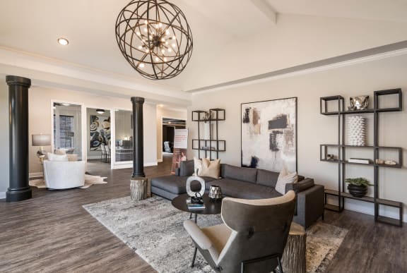 a living room with a couch and a table  at Arlo Luxury homes Apartments, Little Rock, Arkansas