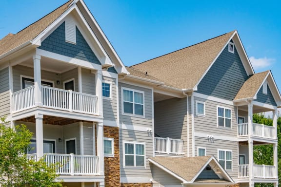 Apartment Home Exteriors with Trees Inviting You Inside at Ashby at Ross Bridge, Hoover, AL