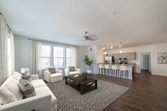 Living Area With Kitchen View at Lakeland Town Square, Lakeland, TN