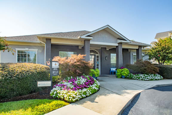 a house with flowers and bushes in front of it at The Shallowford, Tennessee, 37421