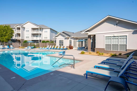 our apartments have a resort style pool with lounge chairs at The Shallowford, Chattanooga, TN, 37421
