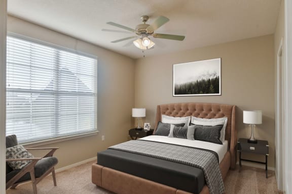Bedroom with large window and ceiling fan at Harbor Island located in Memphis, TN 38103