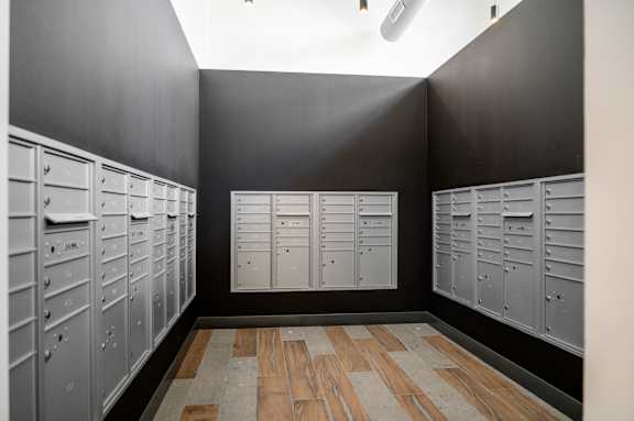 A row of lockers in a room with wooden flooring at Harbor Side at Conwood Flats Apartments, Memphis, Tennessee