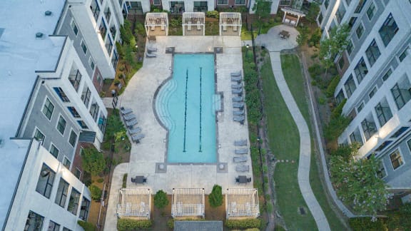 an aerial view of a swimming pool in the middle of a building at The Haven, Atlanta