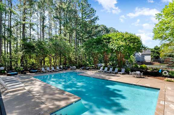 Tranquil Residential Pool Surrounded By Pines at Manchester at Mansell, Roswell, 30076